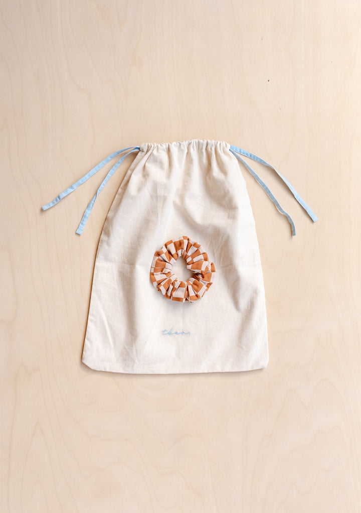 Cotton Pyjamas in Honey Checkerboard by TBCo includes matching scrunchie and cotton drawstring storage bag.