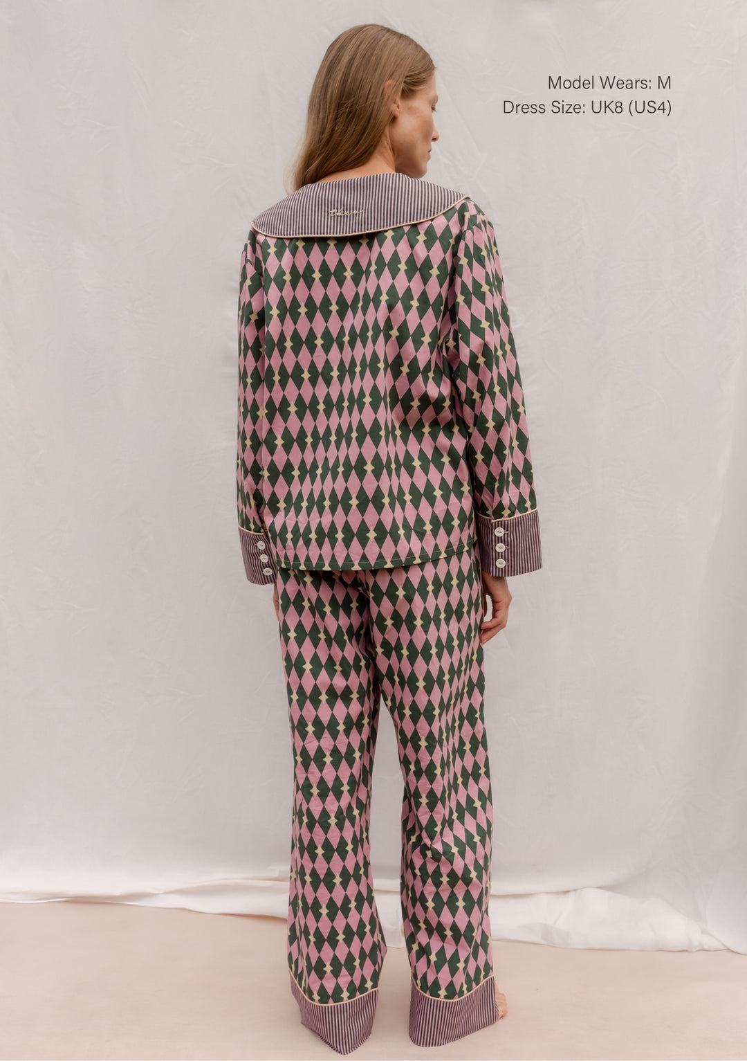 Cotton Pyjamas in Pink Harlequin by TBCo, breathable cotton with green diamonds, camel piping, striped collar, and cuffs.