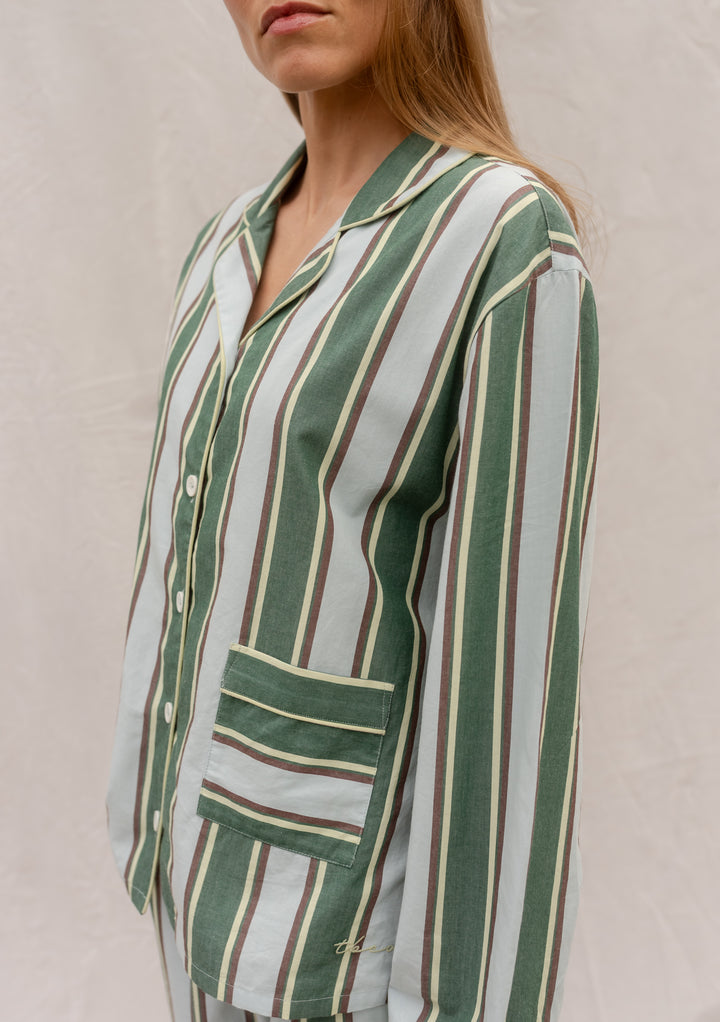 Cotton Pyjamas in Blue Stripe by TBCo featuring breathable fabric, tailored stripes, pockets, and button details for lounge and leisure.