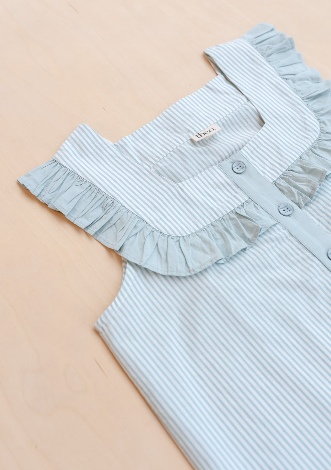 Close-up of TBCo Cotton Pyjamas in Blue Stripe Ruffle sleeveless top with delicate ruffle detail gallery position 6