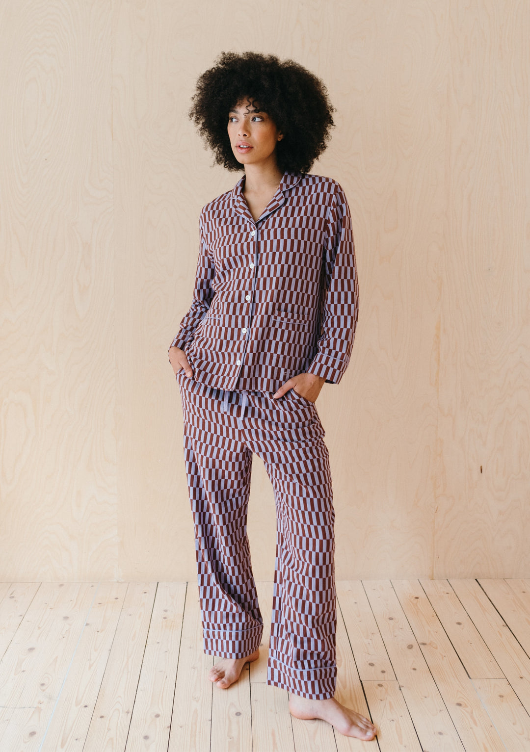 TBCo Cotton Pyjamas in Lilac Checkerboard pattern shown with oversized fit, collared top and wide-leg trousers with piping detail