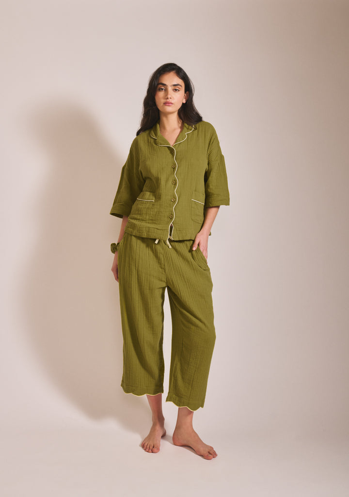 Model wearing TBCo Cropped Cotton Pyjamas in Green with yellow piping, front view, gallery position 1 portrait image
