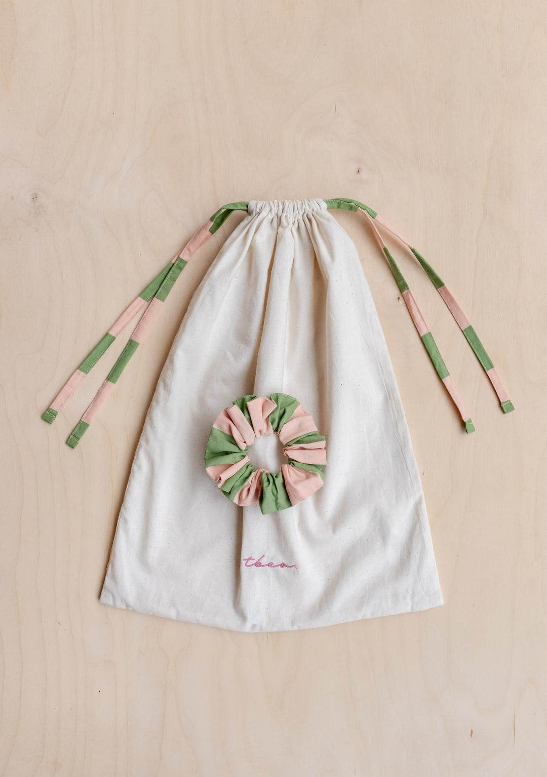 TBCo Cotton Pyjamas in Green Stripe with matching drawstring bag and hair scrunchie in cream, pink and green stripes