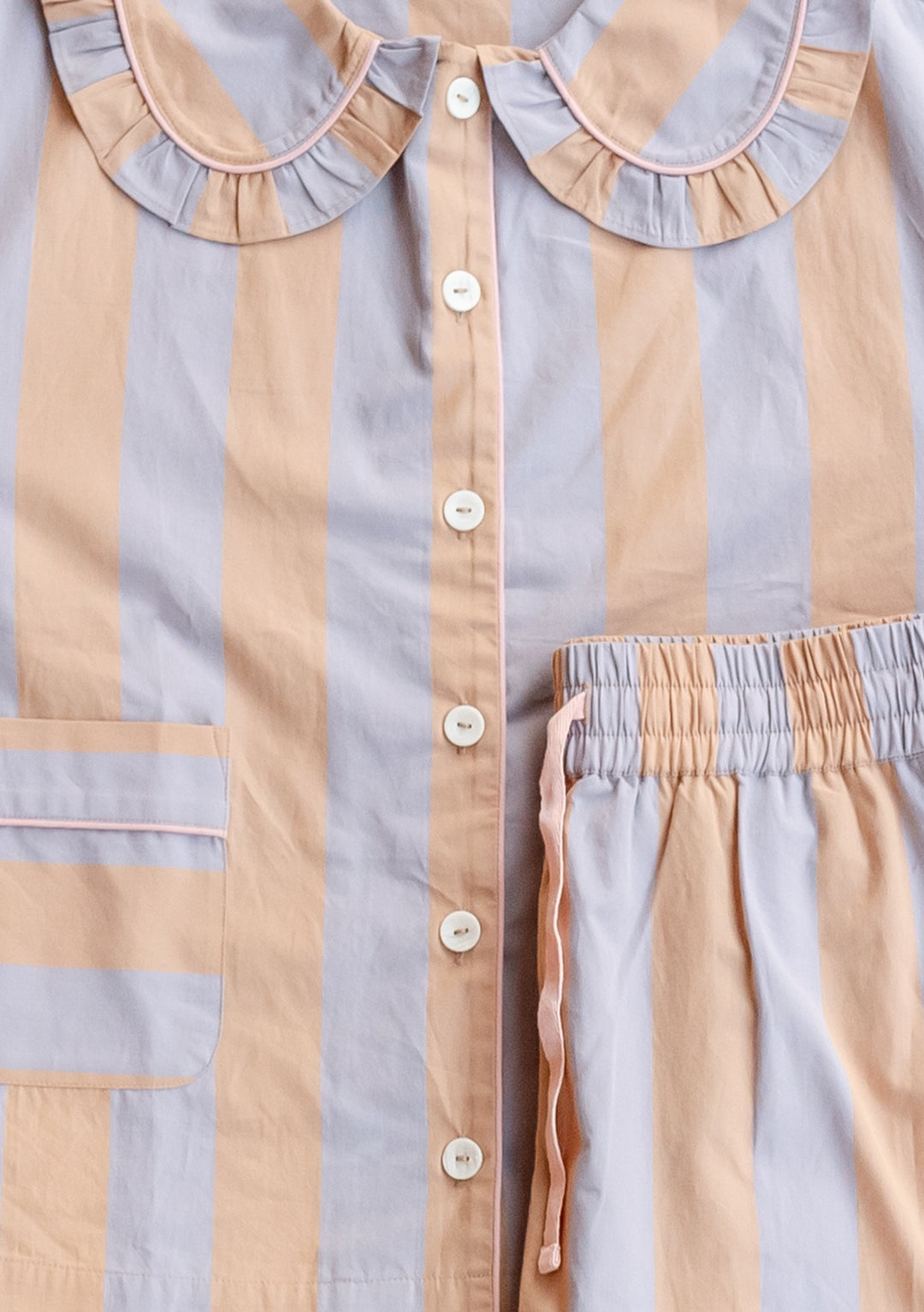 TBCo Cotton Pyjamas in orange and lilac stripes with ruffled collar detail and button-front design, made from 100% cotton