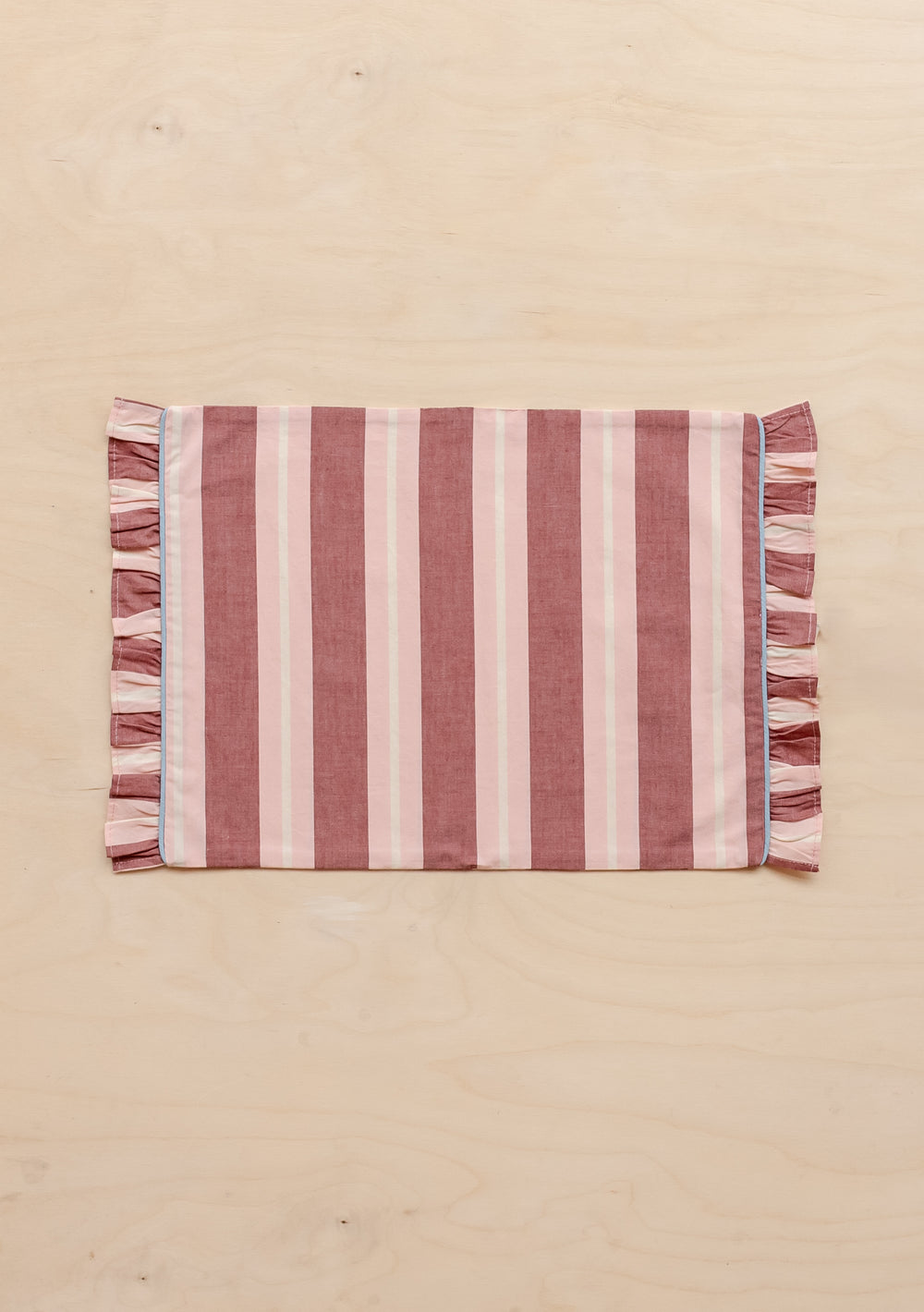 TBCo Cotton Placemat in red and pink stripes with frilled edges, showcasing elegant table decor design by TBCo