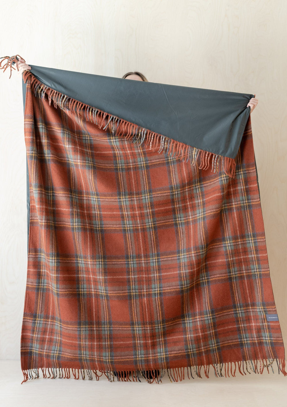 TBCo Recycled Wool Picnic Blanket in Stewart Royal Antique Tartan pattern with water-resistant backing and fringe detail shown unfolded