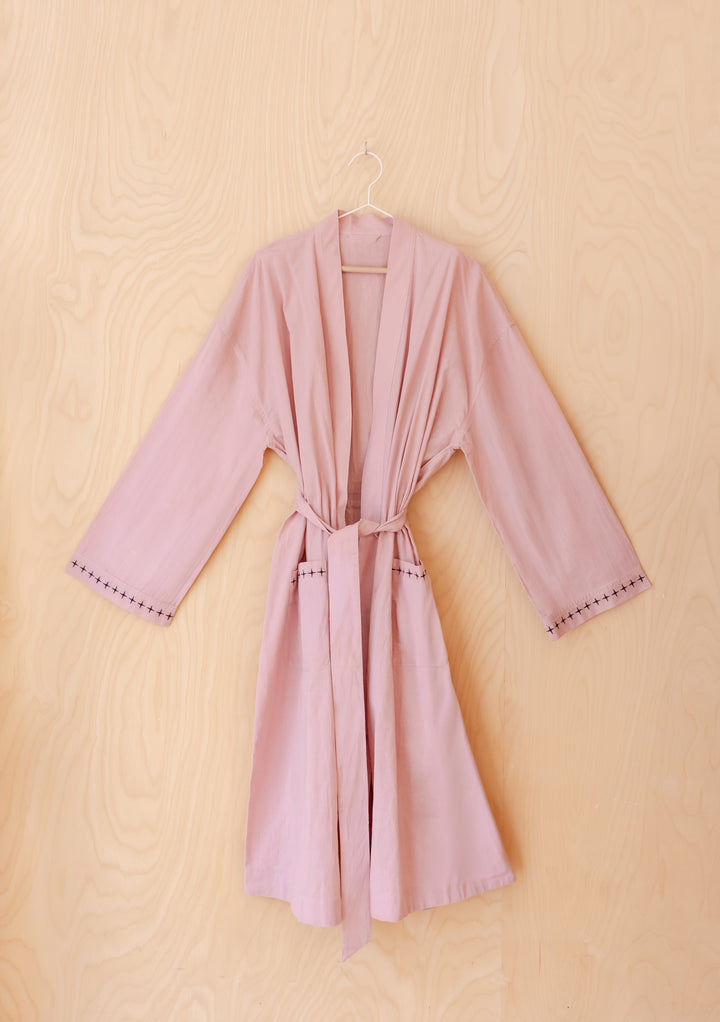 Cotton & Linen Robe in Pink by TBCo hanging on wood wall, gallery position 5 with blackberry embroidery details