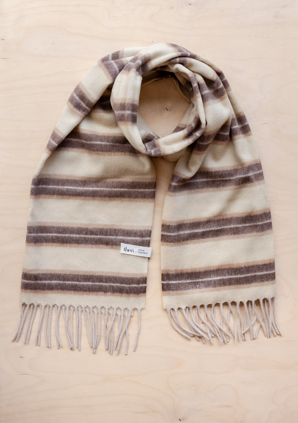 TBCo x Chloe Hayward Banoffee scarf in cream and brown stripes with fringed edges, crafted from pure lambswool