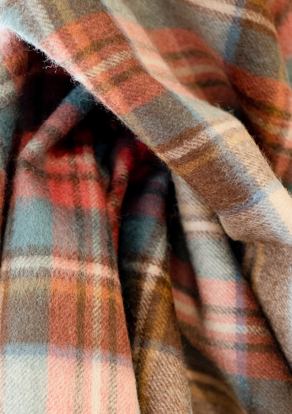 TBCo Cashmere Small Blanket in Stewart Dress Antique Tartan, showing soft folded texture in camel, brown, red and green plaid pattern