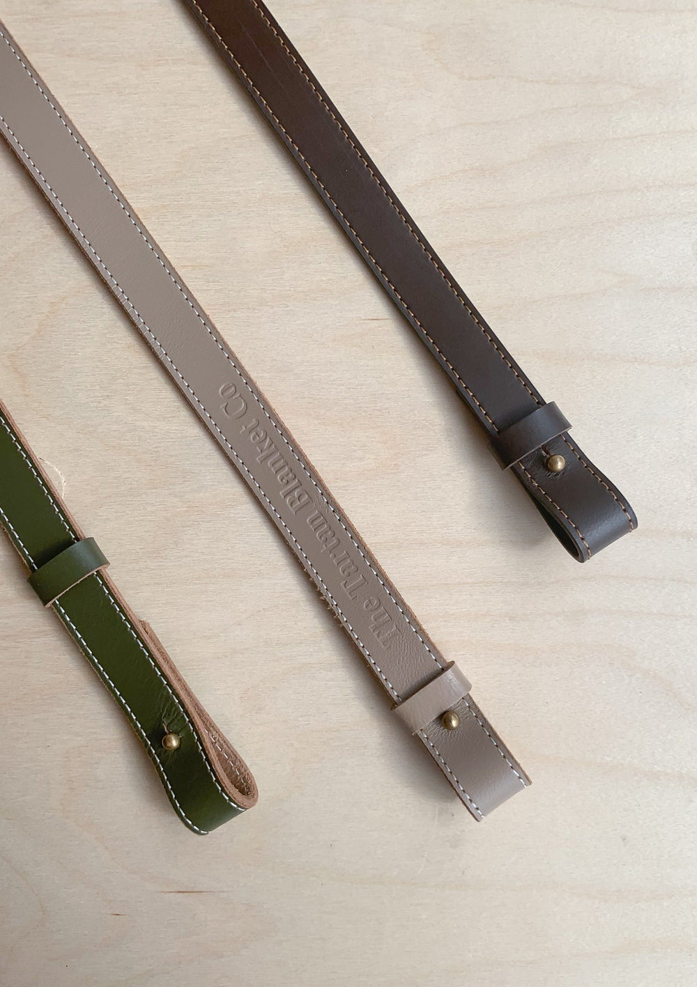 TBCo Leather Long Shoulder Picnic Strap, crafted from sustainable materials for effortless carrying of picnic blankets. Featuring an adjustable design and durable construction, perfect for outdoor adventures.