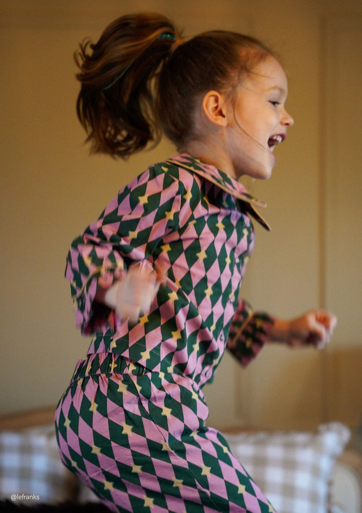 Pyjama enfant en coton rose à motifs arlequins 