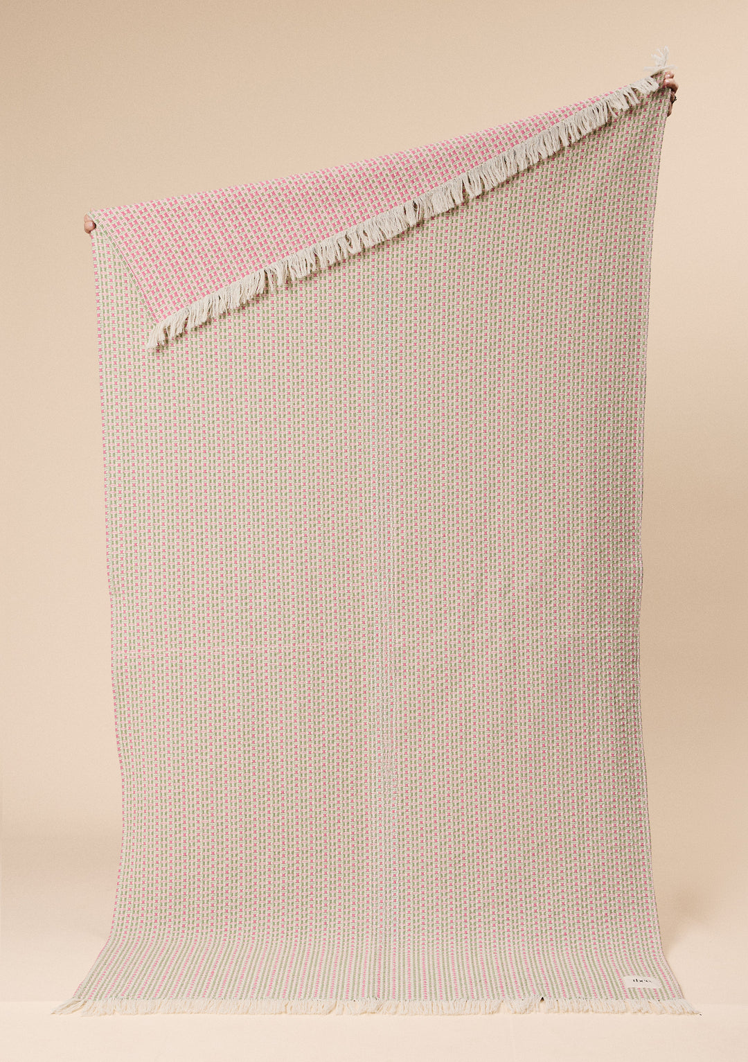 Cotton Throw in Rose Geometric by TBCo with jacquard weave, natural and recycled fibres, Certified B-Corp, women-founded, designed to make an impact