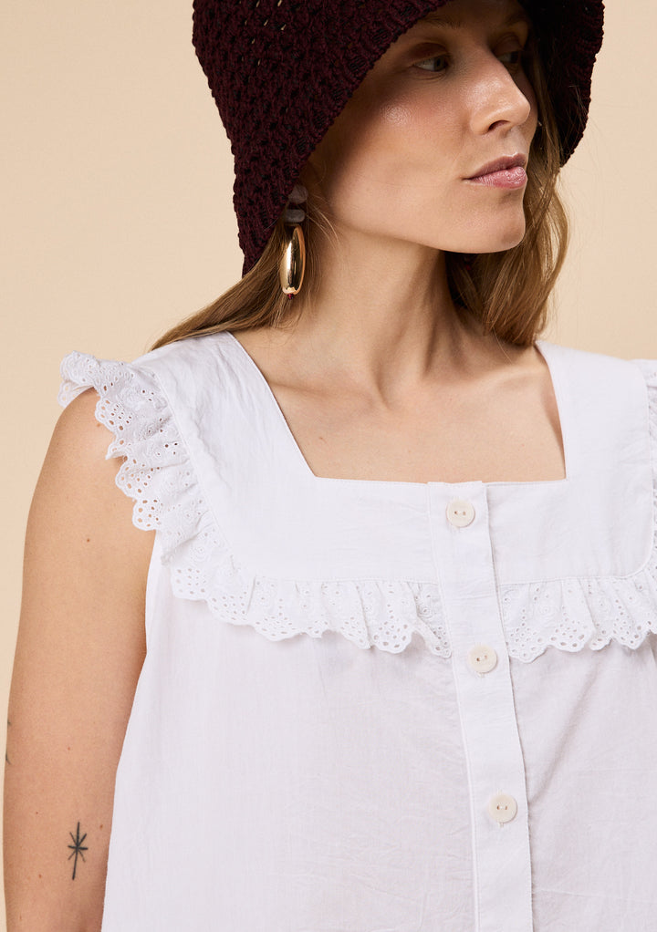 Woman modelling TBCo Cotton Broderie Sleeveless Top in White with natural and recycled fibres, Certified B-Corp, women-founded, designed to make an impact