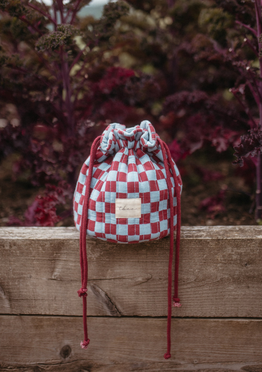 Cotton Wash Bag in Blue Checkerboard by TBCo, quilted cotton with drawstring, compact and roomy for daily use.